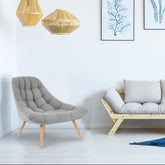 Fauteuil en tissu gris clair