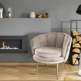 Fauteuil rond en velours taupe avec pieds en métal doré