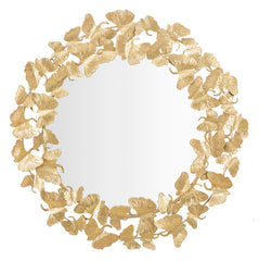 Miroir rond en métal doré décoratif