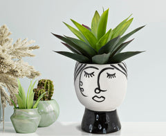 Vase visage Porcelaine Blanche et base Noir