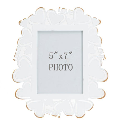 Cadre photo en métal blanc avec incrustations en forme de cœur