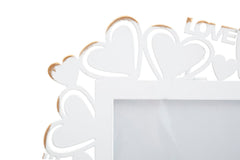 Cadre photo en métal blanc avec incrustations en forme de cœur