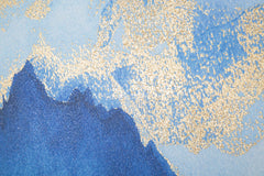 Impression toile design montagne cadre en bois nuances de bleu décorations dorées