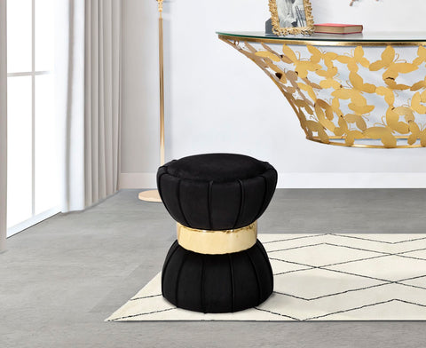 Taburete redondo de terciopelo negro con banda decorativa dorada