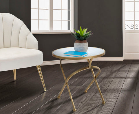 Mesa redonda Glam de mármol con patas de metal dorado