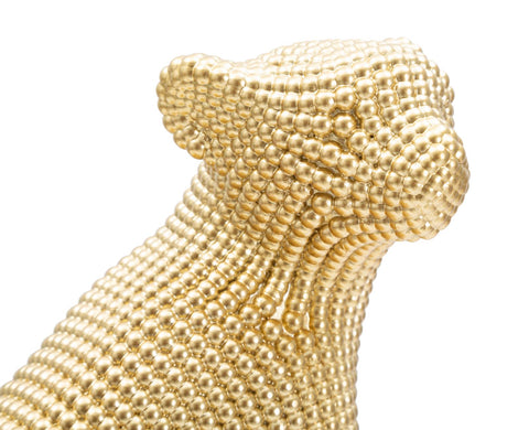 Estatua de leopardo dorado