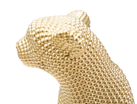Estatua de leopardo dorado