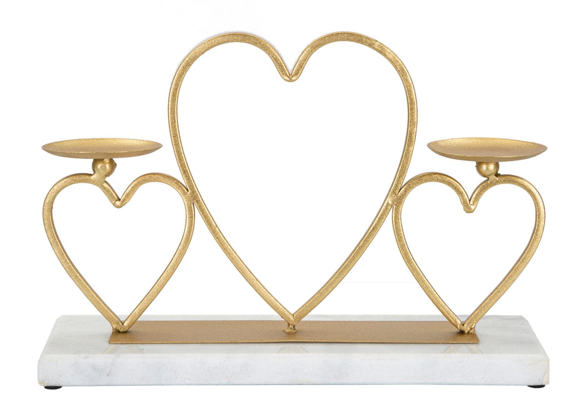 Candelabro de metal dorado con base de mármol blanco y corazones