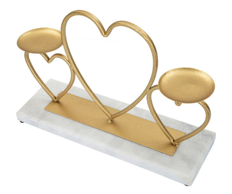 Candelabro de metal dorado con base de mármol blanco y corazones