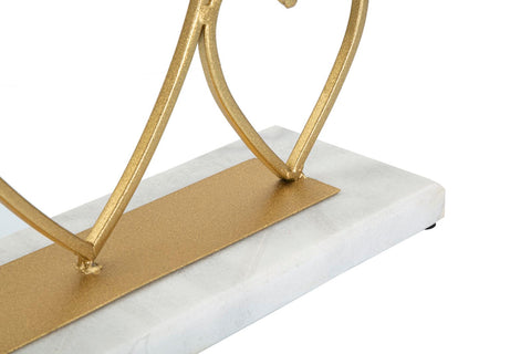 Candelabro de metal dorado con base de mármol blanco y corazones