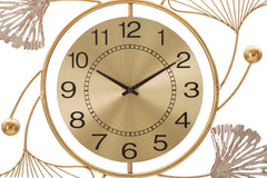 Horloge murale décorative avec feuilles et motifs abstraits