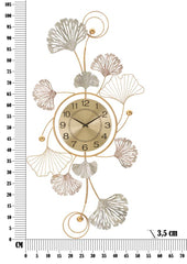 Horloge murale décorative avec feuilles et motifs abstraits