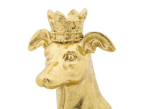 Estatua de perro sentado en oro con corona