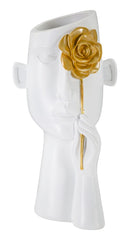 Vase visage orné d'une fleur dorée