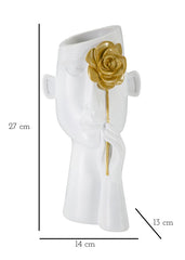 Vase visage orné d'une fleur dorée
