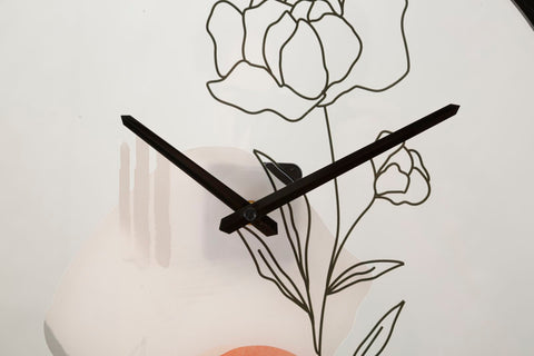 Reloj de pared redondo con diseño de rosa