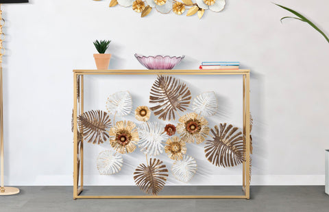 Consola Floris de metal dorado y cristal espejo adornada con hojas y flores