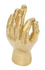 Statue dorée en forme de main OK