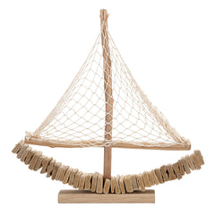 Sculpture de voilier en bois avec voile en tissu et base bois