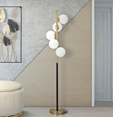 Lampe sur pied 5 lumières Glamyy Métal doré et noir sphères en verre blanc