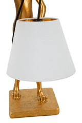 Lampe de table en résine dorée modèle Lapin abat-jour en tissu blanc