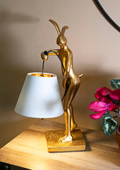 Lampe de table en résine dorée modèle Lapin abat-jour en tissu blanc