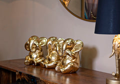 Ensemble de 3 éléphants assis dorés