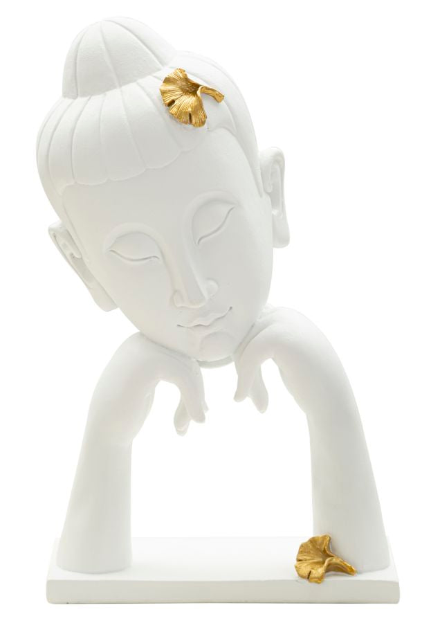 Cabeza de Buda decorada con hojas doradas