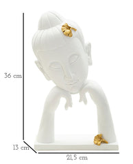 Tête de Bouddha décorée feuilles dorées