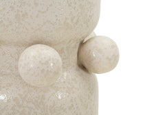 Vase en céramique blanche décoré de sphères