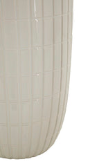 Vase en céramique blanche avec anneaux dorés