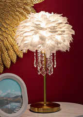 Lampe de table métal doré abat-jour plumes synthétiques ornements cristaux