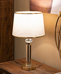 Lampe de table Praga métal doré abat-jour tissu beige bordure dorée