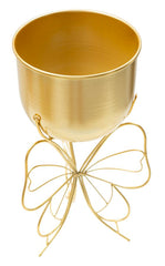 Porte-vase en métal doré avec base papillon