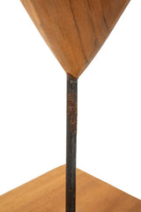 Sculpture en cœur Teck recyclé sur socle métal