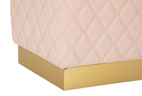 Puf pentagonal tapizado Sharon en símil piel rosa con base dorada