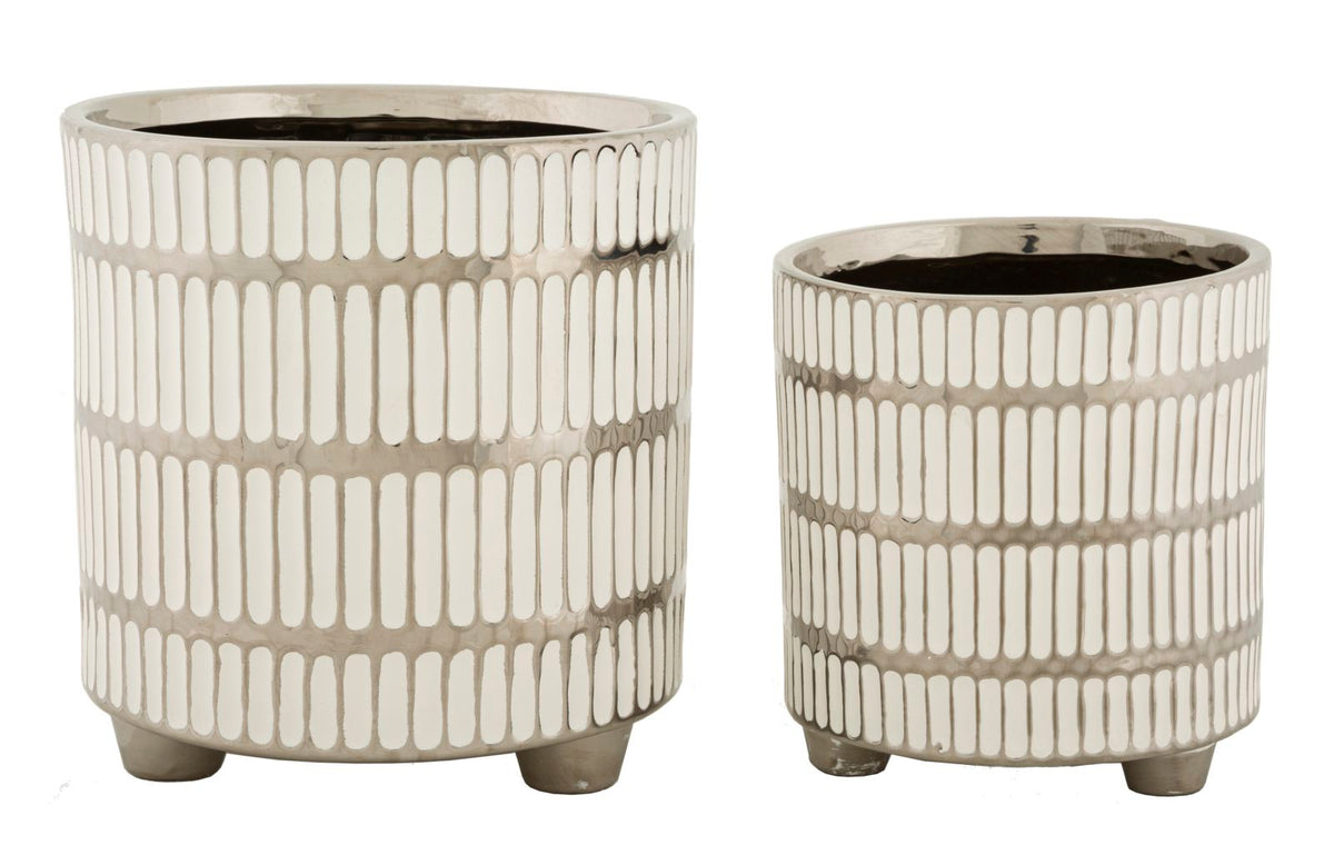 Ensemble de deux vases en céramique décorés argenté