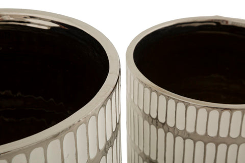 Ensemble de deux vases en céramique décorés argenté