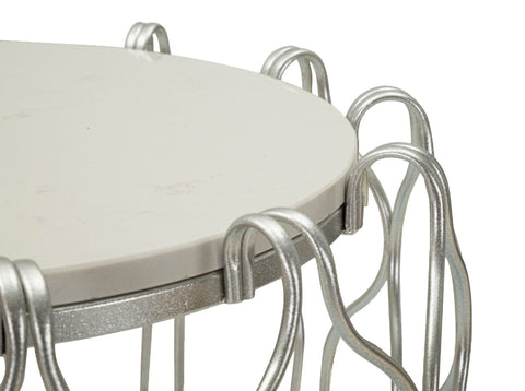 Mesa de centro de mármol y metal plateado