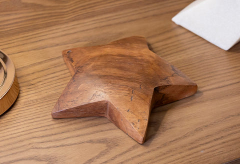 Escultura de estrella de teca