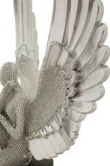 Statuette argentée avec ailes déployées