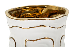 Vase en céramique blanche avec lignes dorées