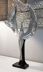 Statue en argent avec ailes