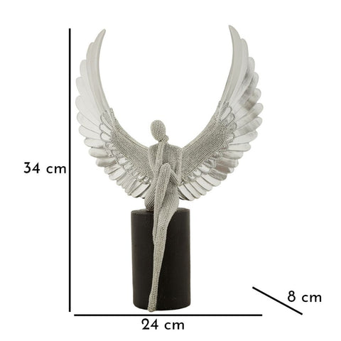 Estatuilla plateada con alas extendidas