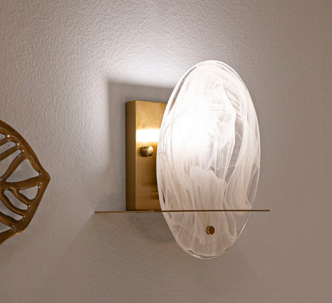 Aplique de pared de metal dorado y cristal redondo