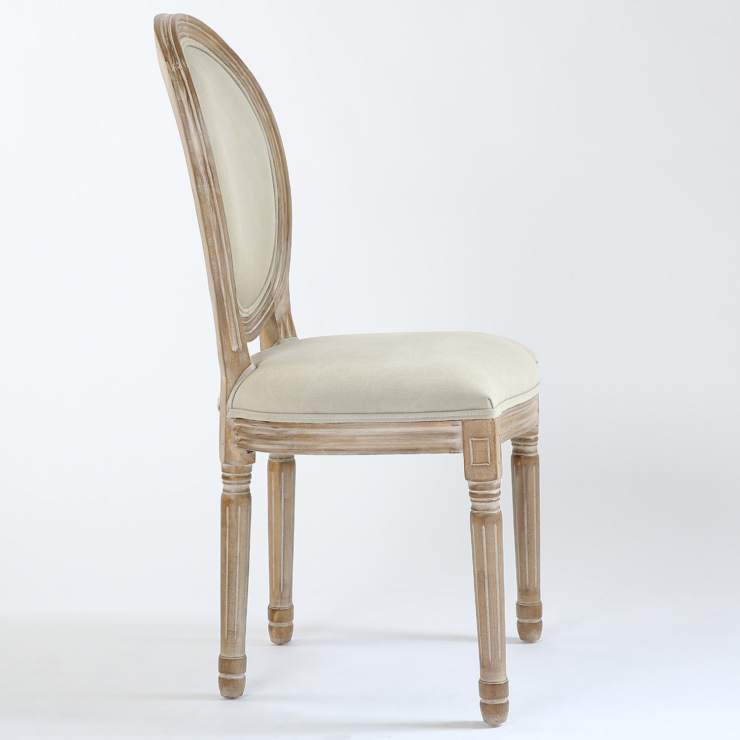 La chaise médaillon Louis XVI tissu beige vue de profil