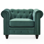Fauteuil en velours vert capitonné