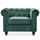 Fauteuil en velours vert capitonné