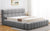 Lit-coffre Carita avec rebords matelassés en tissu gris foncé 180x200cm