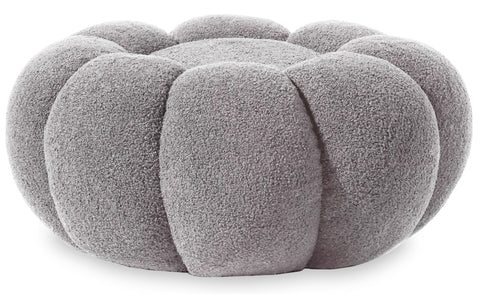 Puf Basha de diseño floral en tela bouclé gris